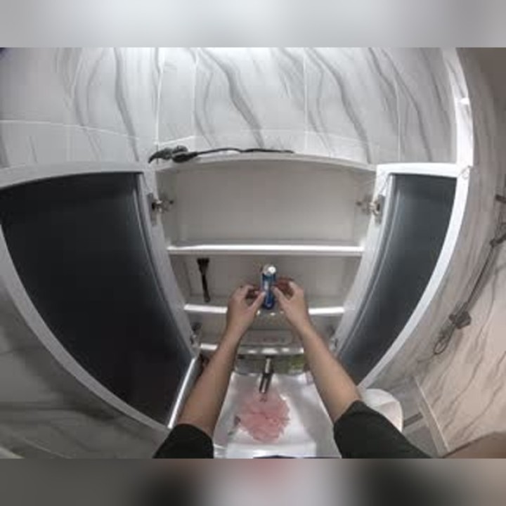 First-person wash counter organization with both hands visible